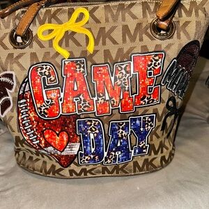 Michael Kors Tan Monogram Tote upcycled an official game day bag.